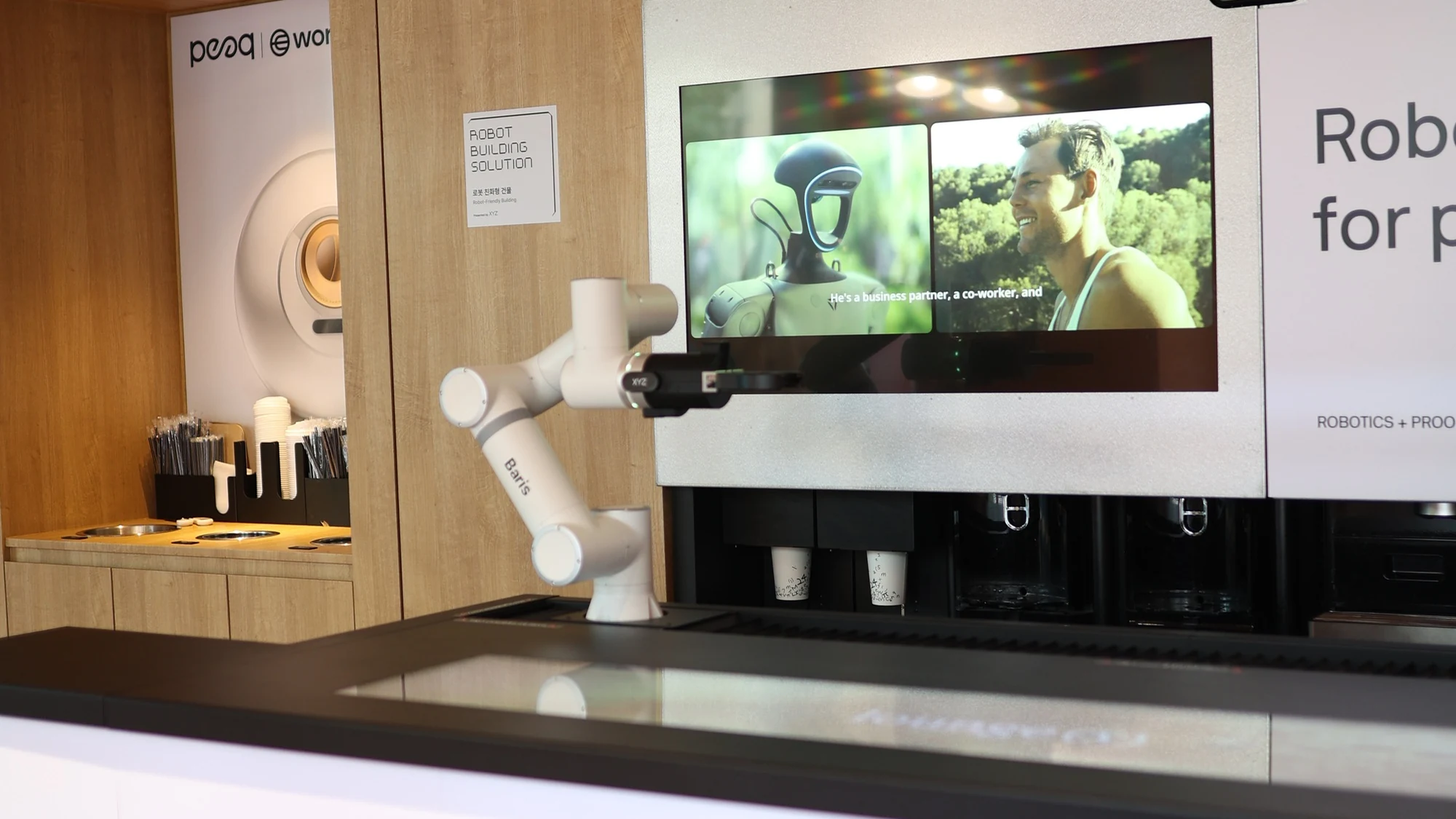 World × peaq — Co-branded robotics display counter, KBW 2026