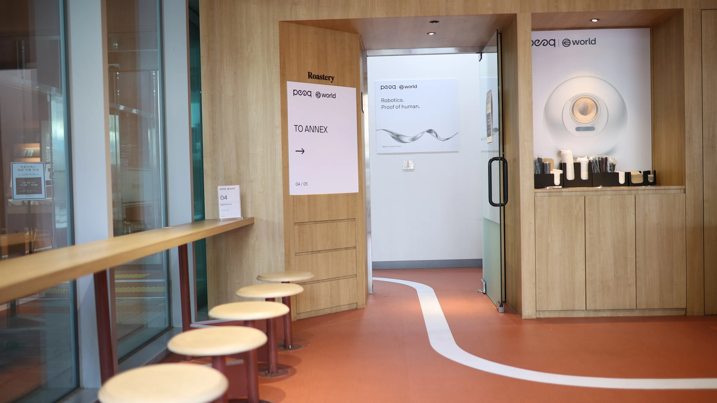 World × peaq — Event interior and display entrance, KBW 2026