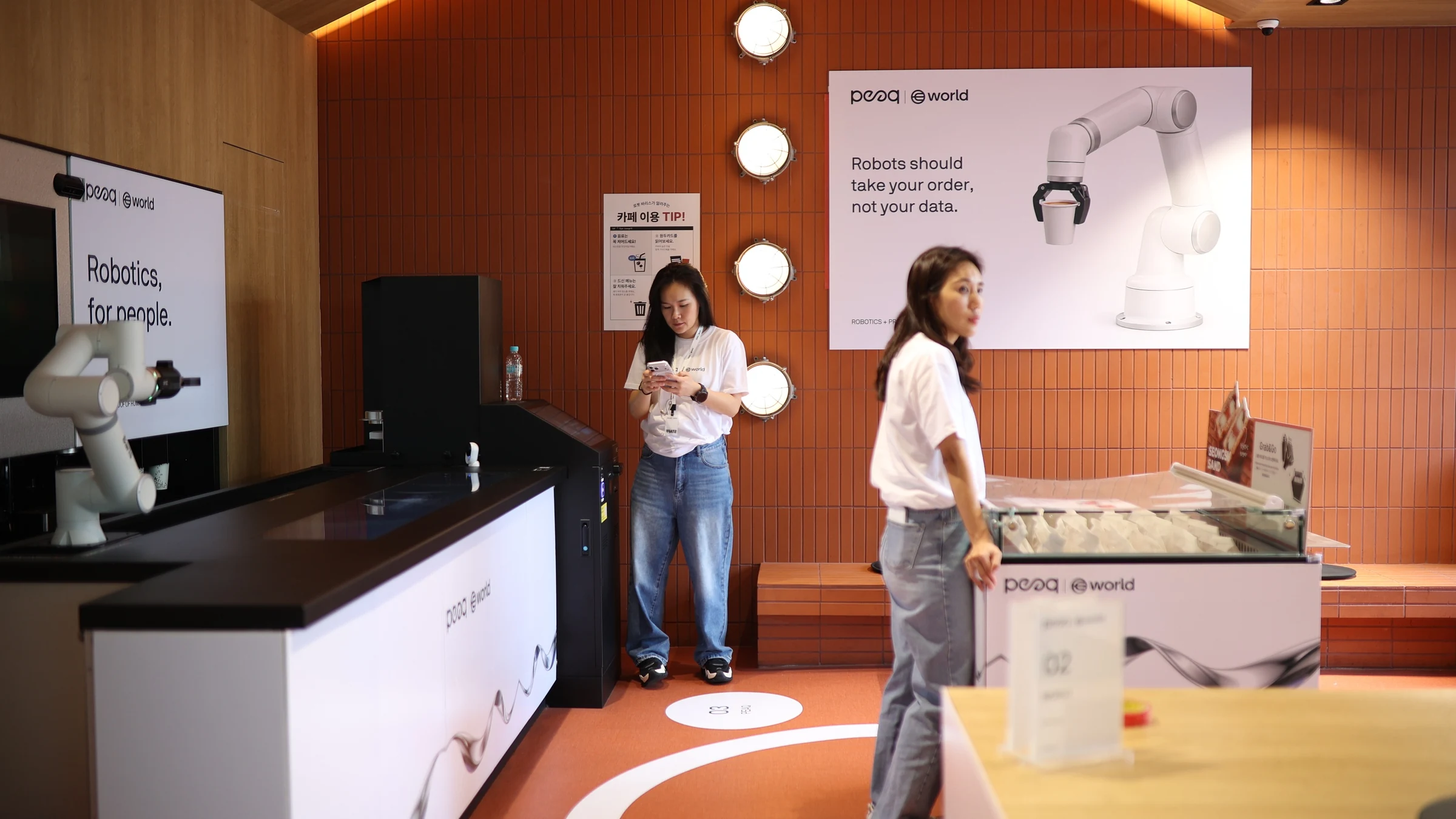 World × peaq — Visitors and exhibits inside the venue, KBW 2026